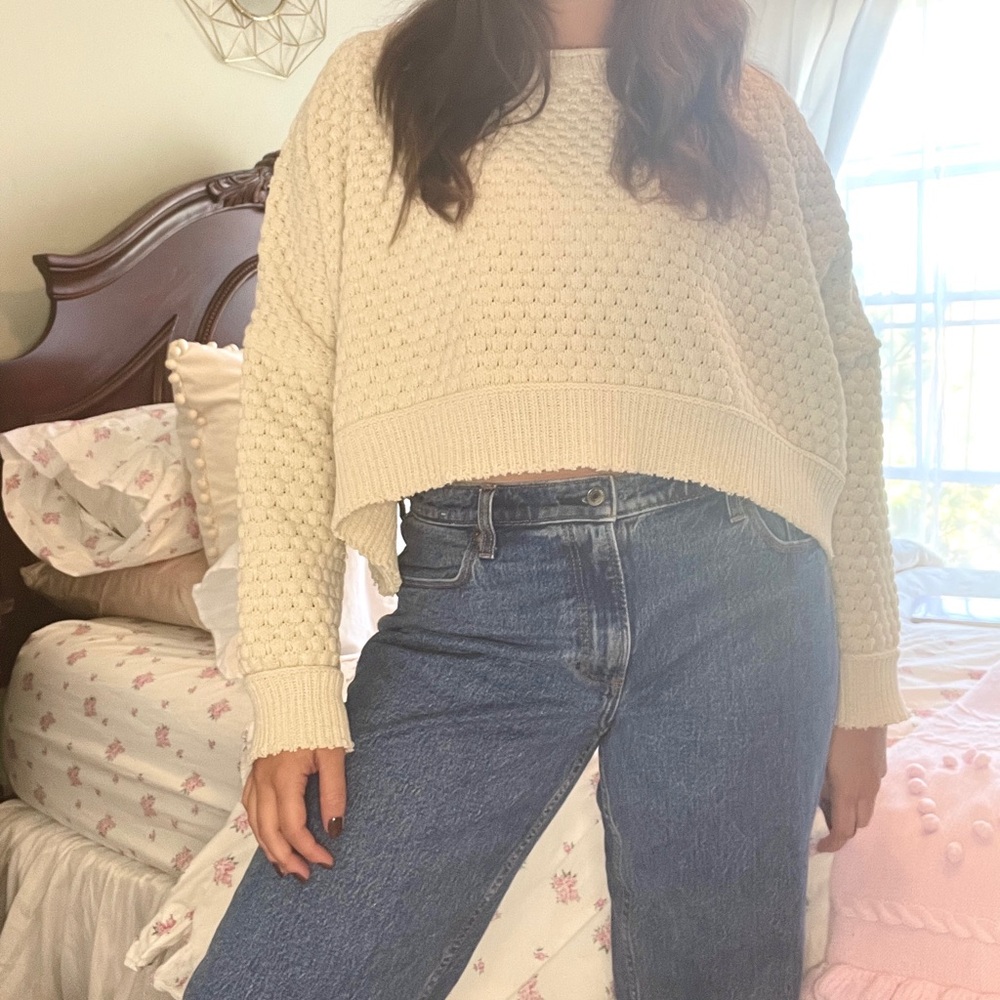 Cream textured sweater with a cropped relaxed fit